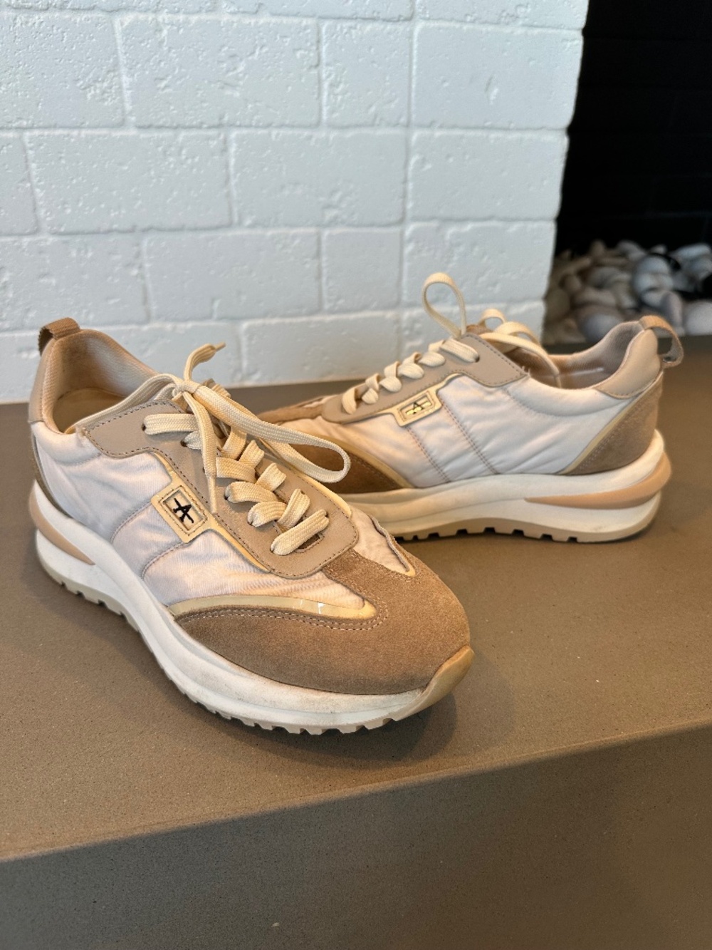 Size 8 Aquatalia sneakers. VGUC